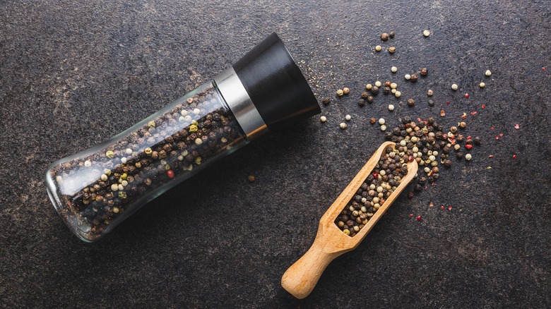 Pepper mill and wooden scoop