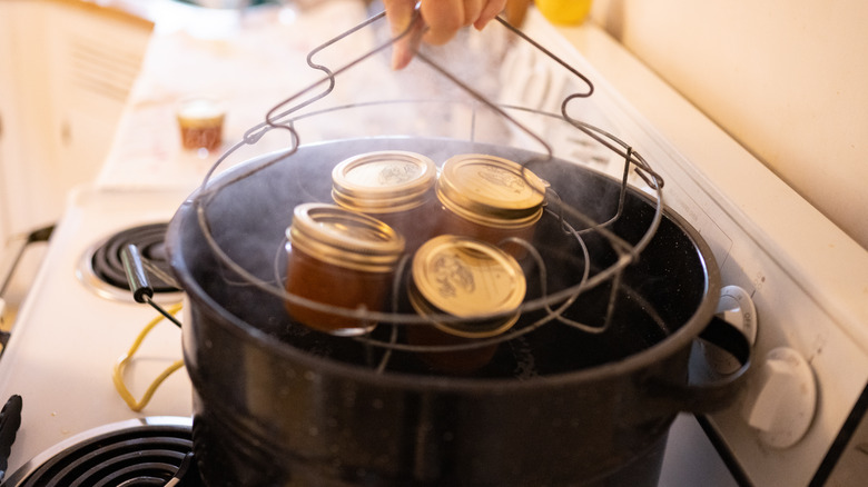 Hot jars in canning rack