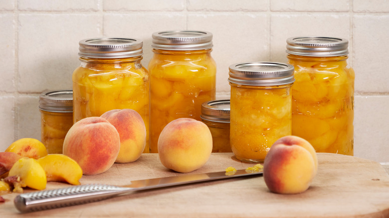 Jars of peaches on counter