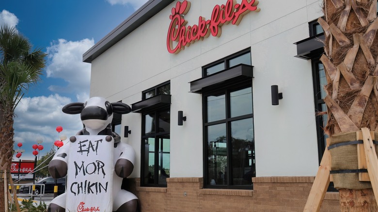 Cow outside Chick-fil-A restaurant