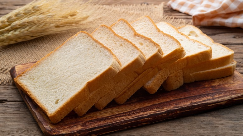 white bread slices on board