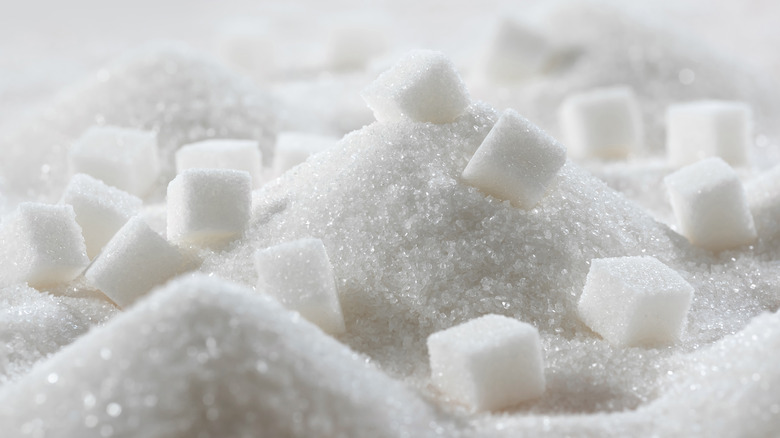 sugar cubes on sugar grains