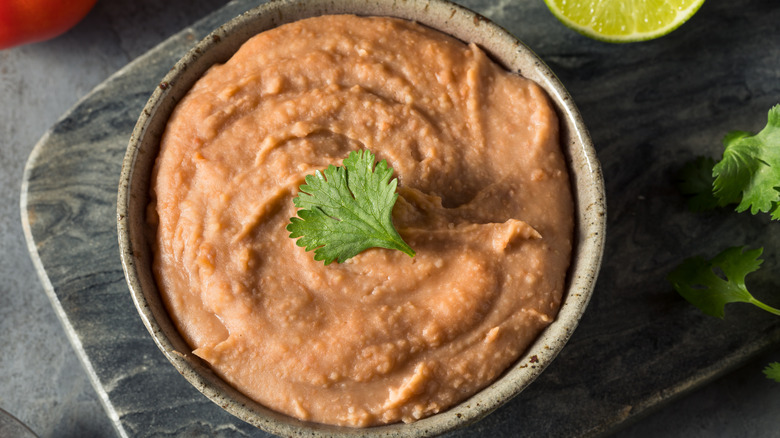 homemade refried pinto beans bowl