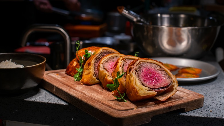 beef Wellington slices on platter