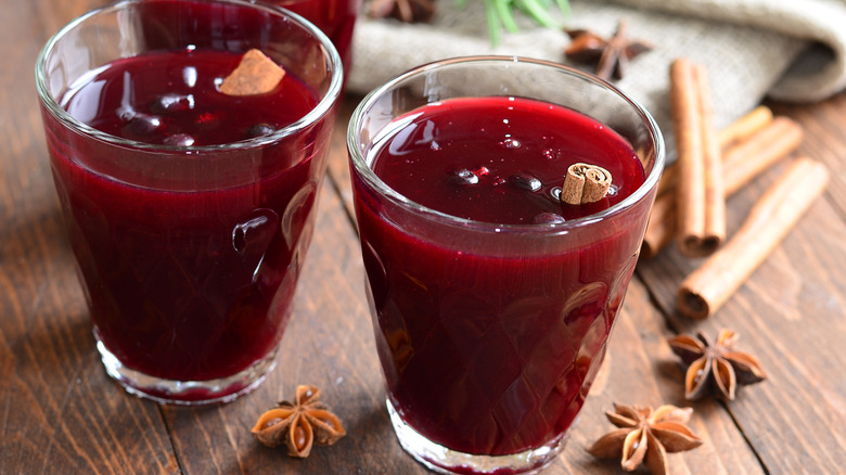 Cinnamon sticks in berry cocktail