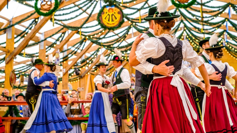 couples dancing in Oktoberfest costumes