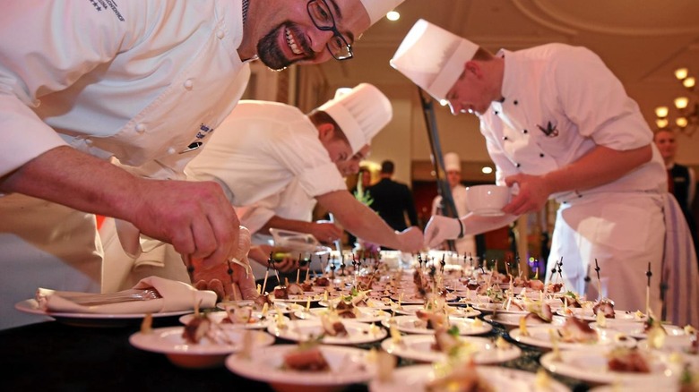 chefs preparing small plates