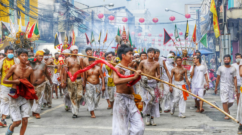 parade marchers wearing white 