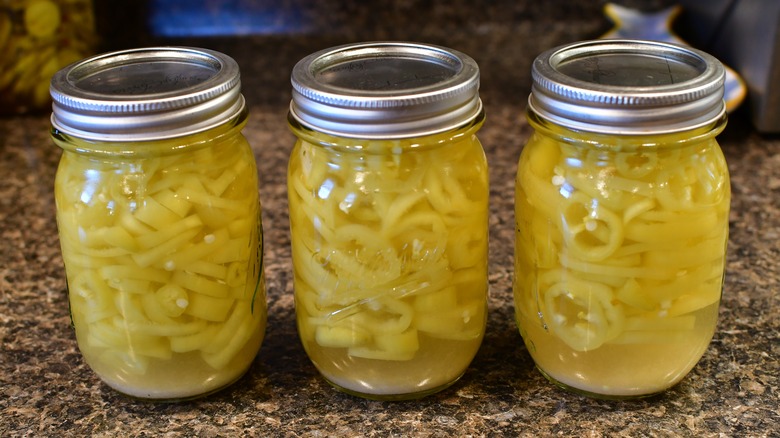 Pickled banana peppers in jars