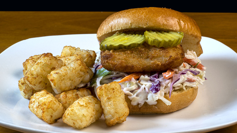 fish sandwich with coleslaw and pickles