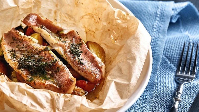 cooked fish in parchment paper