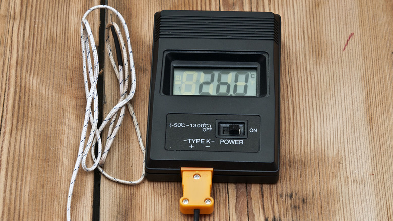 digital thermometer on table