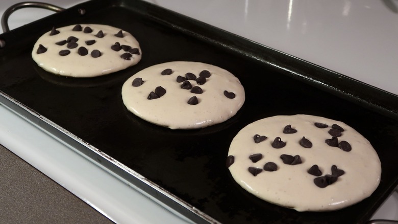 Making chocolate chip pancakes