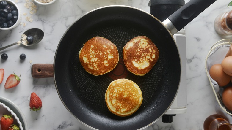 Three pancakes in pan