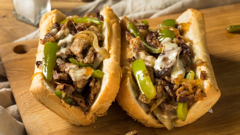 Philly cheesesteakiwth green peppers and onions