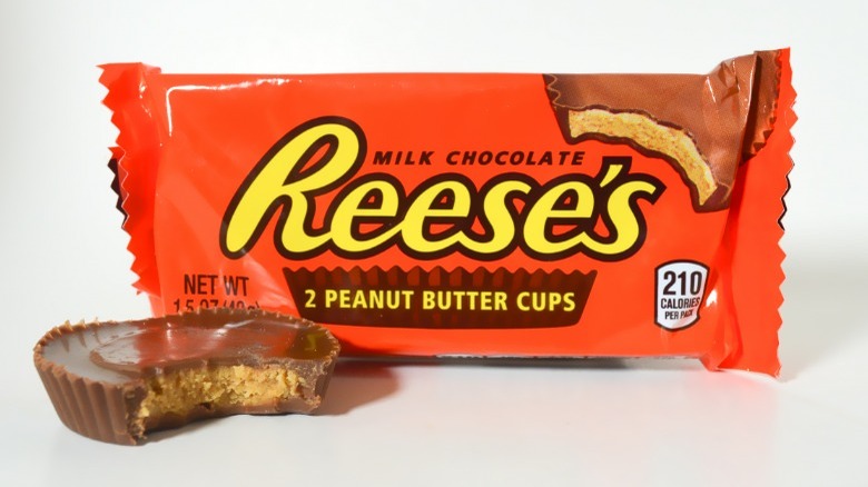 Reese's Peanut Butter Cups bag and one cup with bite 