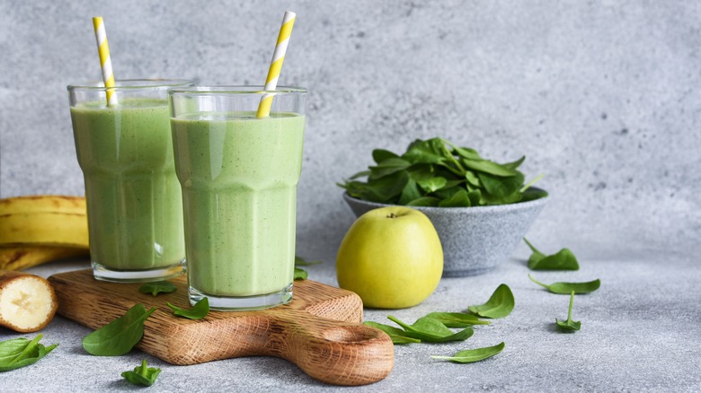 two glasses green smoothies