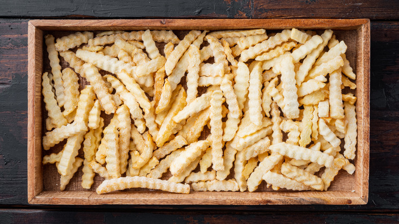 frozen fries in wooden box