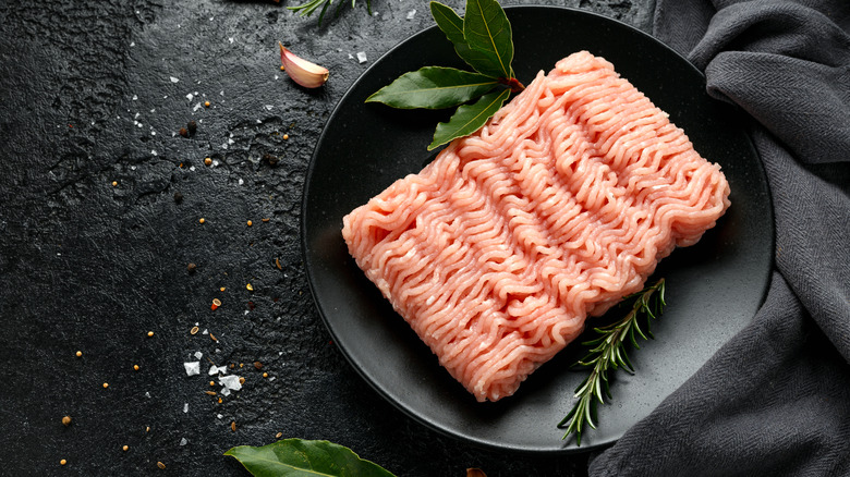 Ground turkey on black plate