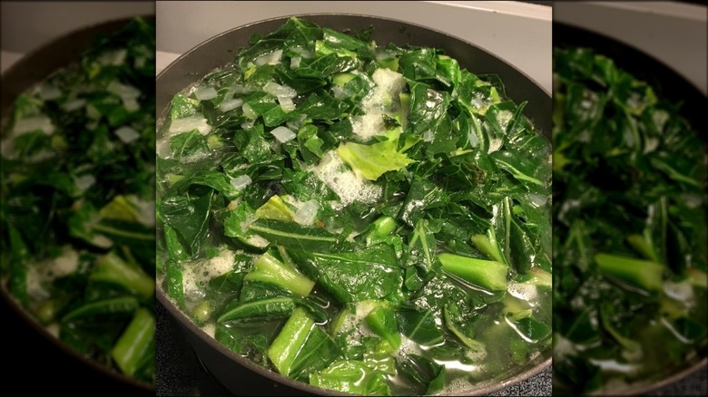 Collard greens cooking in pot