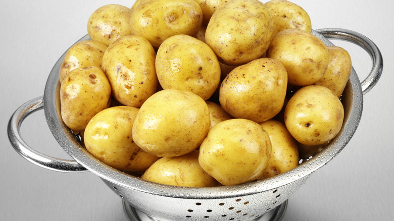 colander full of potatoes