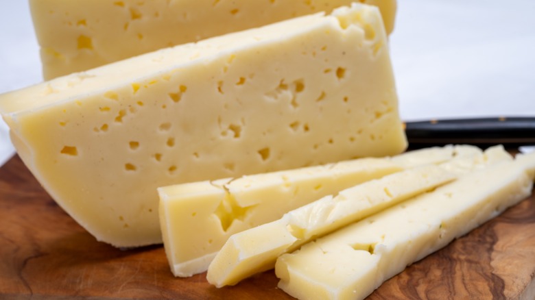 Slices of fresh Asiago cheese