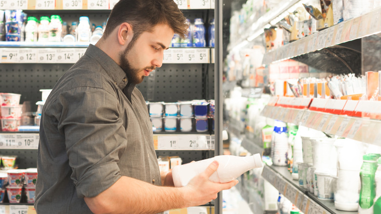 Person looking at dairy aisle