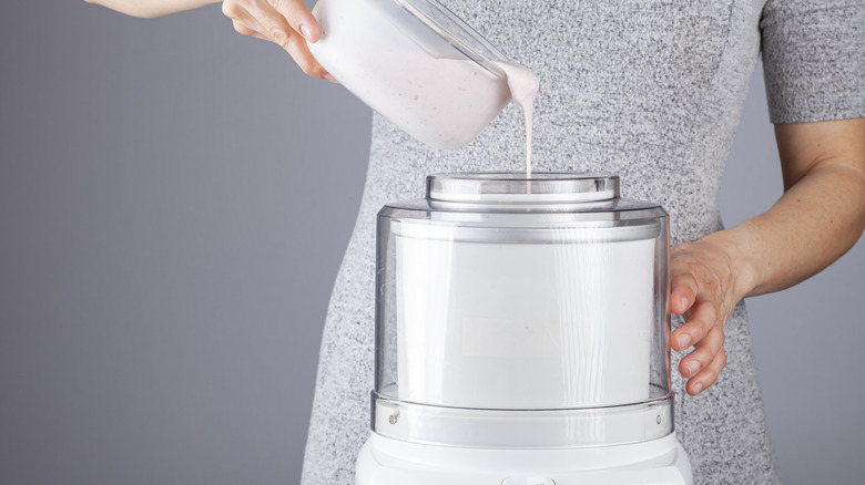 Person pouring ice cream base