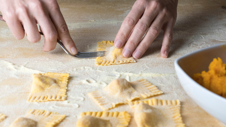 Person making ravioli