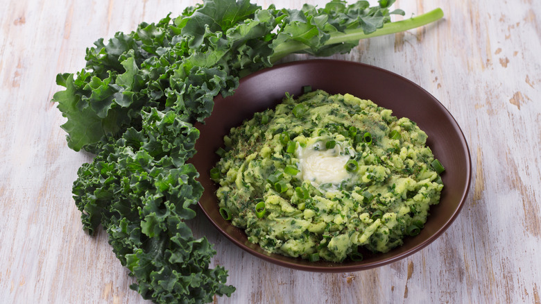 bowl of mashed potatoes with kale