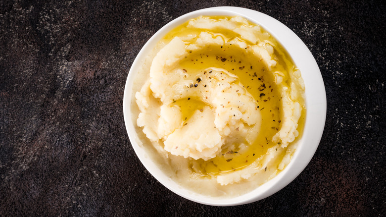 bowl of mashed potatoes with oil