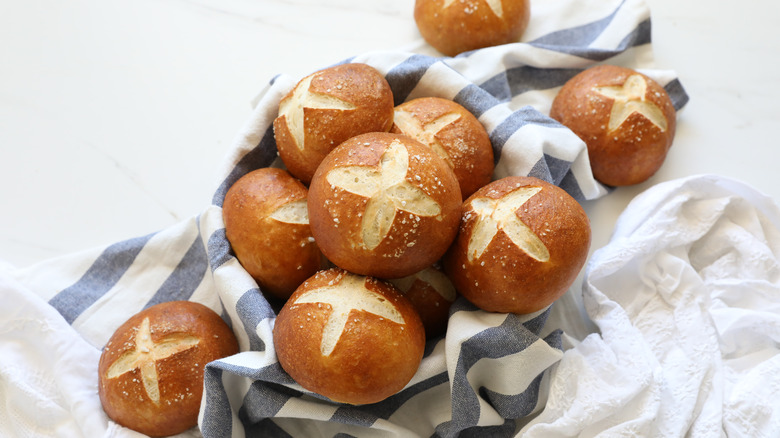 Pretzel buns on towel