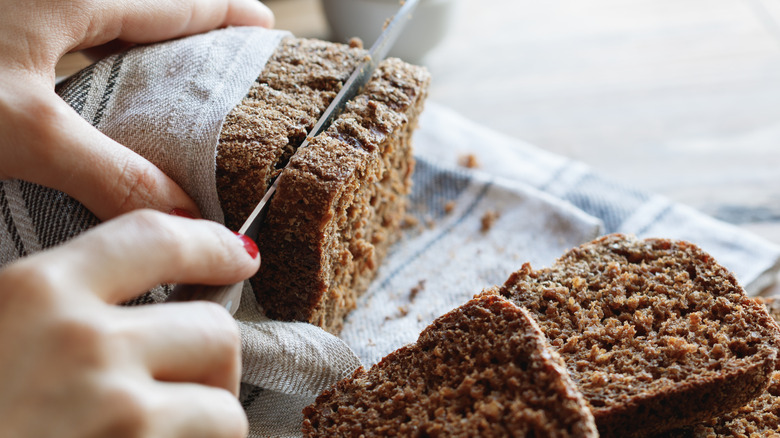 Rye bread being sliced