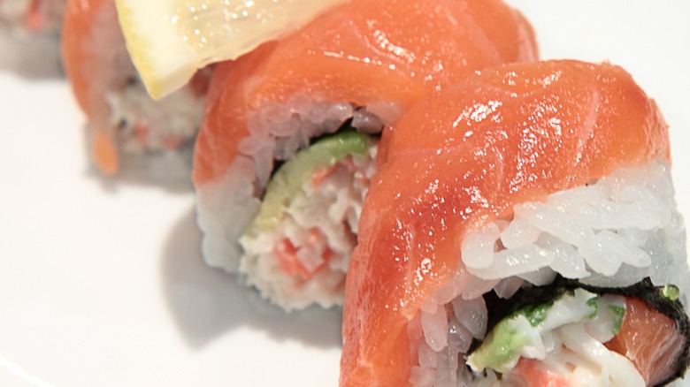 Glistening salmon sushi roll