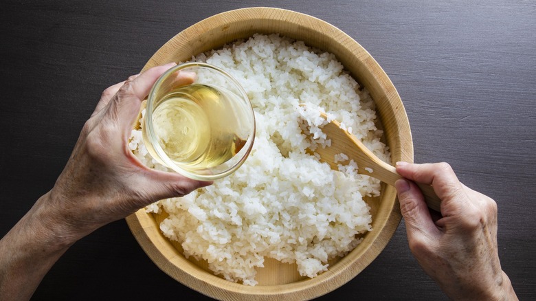 Seasoning sushi rice in bowl