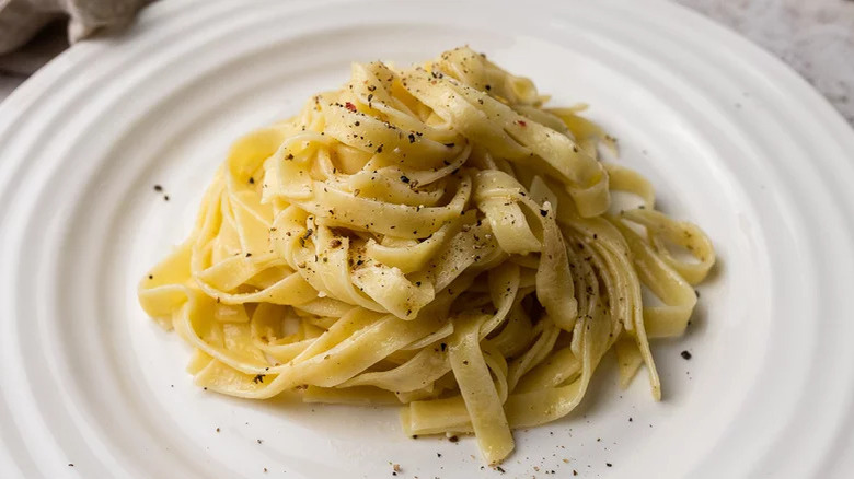 Pasta Alfredo on white plate