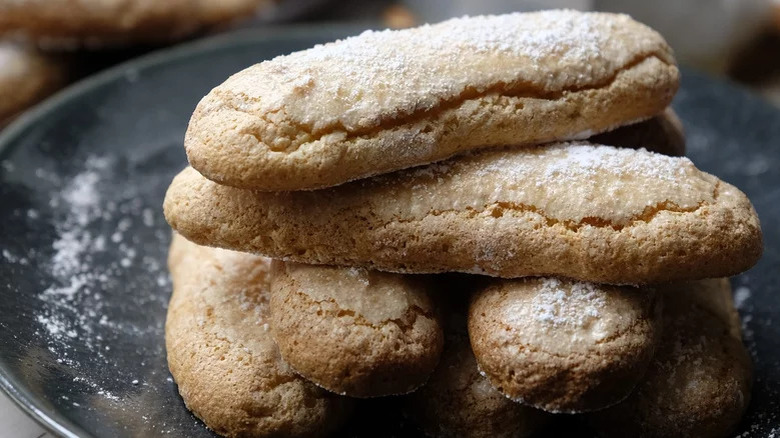 Ladyfingers on black plate