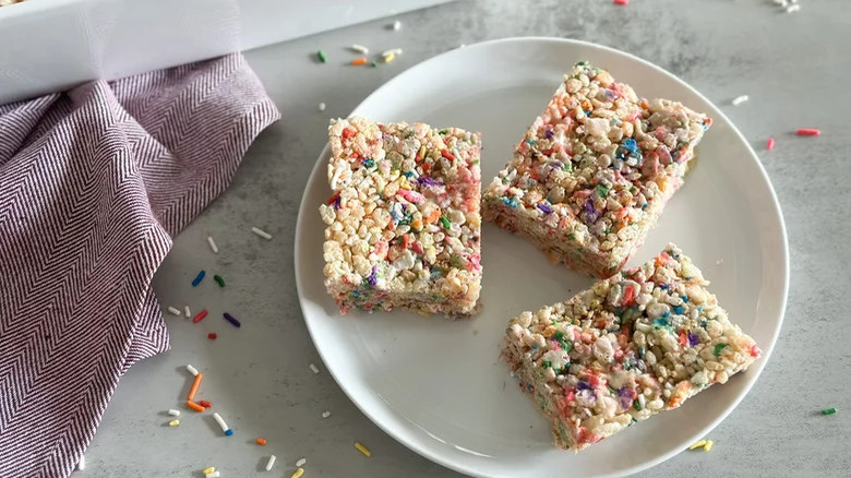 Rainbow rice krispies treats on plate