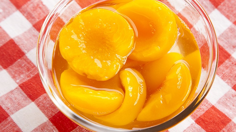 Tinned peaches in bowl