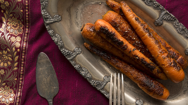 Charred carrots on plate