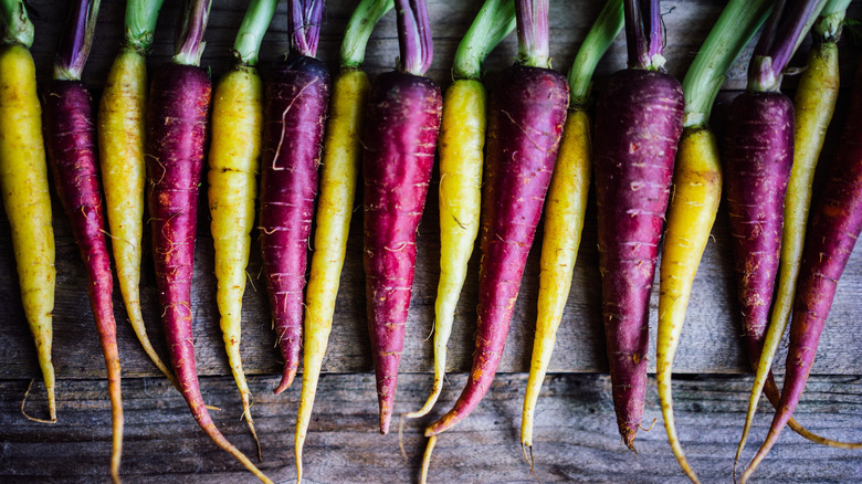 Heirloom carrots on wood