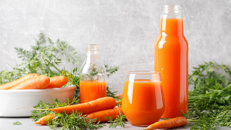 Carrots and carrot juice in bottles