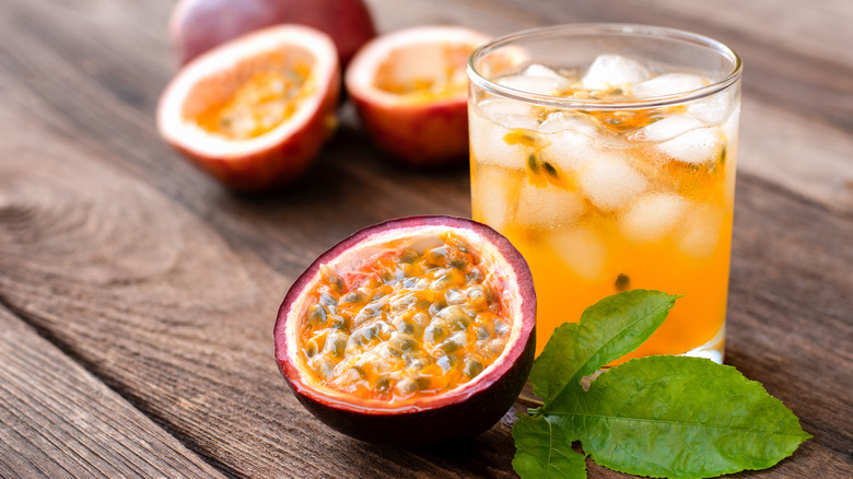 Passionfruit and passionfruit juice in glass