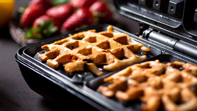 Two waffles in waffle iron