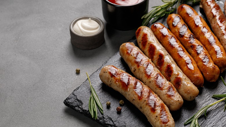 grilled sausages on platter