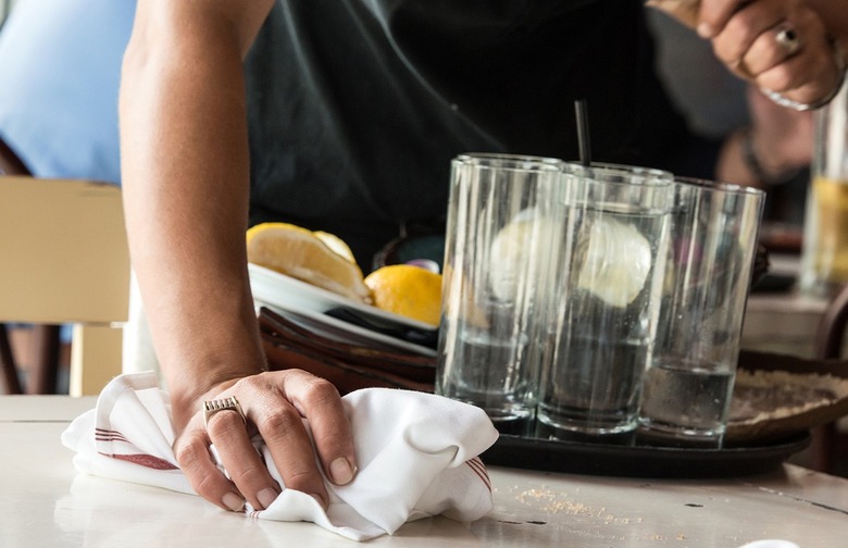 Tables are cleaned with a dirty rag