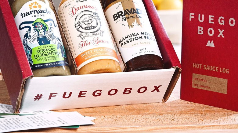 Fuego Box hot sauces in box with hot sauce log