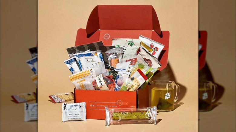 Bokksu Snack Box filled with of crackers, tea, and more