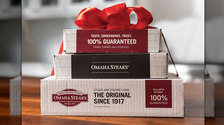 Omaha Steaks boxes with red ribbon and bow