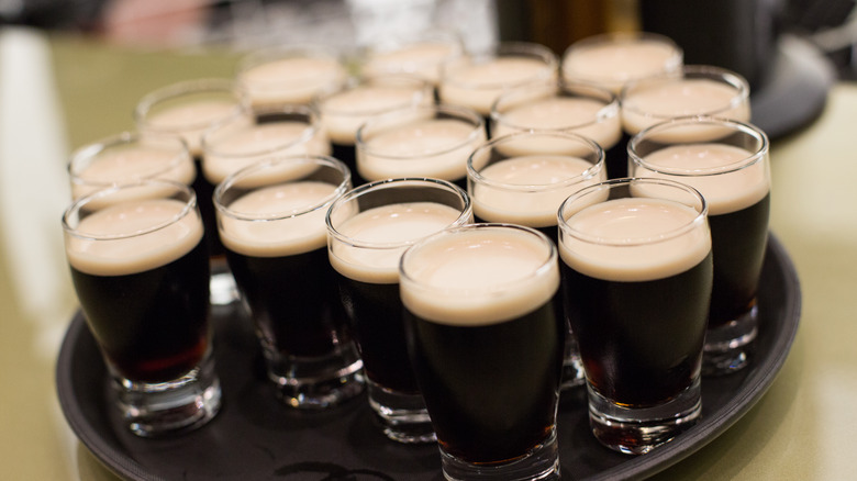 pints of Guinness on a tray